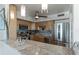 Bright kitchen featuring stainless steel appliances, light wood cabinets, and marble countertops at 30 Turner St # 604, Clearwater, FL 33756