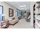 Bright library with a couch, chairs, bookshelves, and a cozy reading area at 30 Turner St # 604, Clearwater, FL 33756