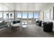 Living room with large sliding glass doors to a balcony and modern decor at 30 Turner St # 604, Clearwater, FL 33756