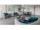 Open-concept living and dining area featuring modern furniture and decor at 30 Turner St # 604, Clearwater, FL 33756