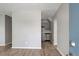Open living space showcases updated flooring, a modern color palette, and natural light flowing into the kitchen at 3003 E 27Th Ave, Tampa, FL 33605