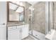 Beautiful bathroom featuring a glass enclosed shower, granite countertops, and white vanity at 307 S Gomez Ave # 1, Tampa, FL 33609
