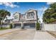 Beautiful two-story home with a two-car garage and manicured landscaping at 307 S Gomez Ave # 1, Tampa, FL 33609