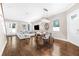 Spacious living room with hardwood floors and plenty of natural light at 307 S Gomez Ave # 1, Tampa, FL 33609