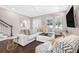 Comfortable living room with a large sectional and stylish accent chair at 307 S Gomez Ave # 1, Tampa, FL 33609