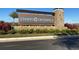 A community sign for Chapel Crossings with well-maintained landscaping along a paved road at 31418 Hayman Loop, Wesley Chapel, FL 33545