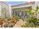 Beautiful courtyard showcasing a charming water feature, lush greenery, and inviting outdoor seating area, perfect for relaxation at 356 22Nd Ne Ave, St Petersburg, FL 33704