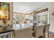 Bright kitchen featuring a breakfast bar, stainless steel refrigerator, and decorative backsplash at 356 22Nd Ne Ave, St Petersburg, FL 33704
