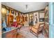 Inviting living room featuring hardwood floors, eclectic decor, and an open layout, perfect for entertaining and relaxation at 356 22Nd Ne Ave, St Petersburg, FL 33704