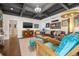 Inviting living room showcasing beamed ceiling, stylish decor, and hardwood floors at 356 22Nd Ne Ave, St Petersburg, FL 33704