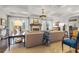 Bright living room with coffered ceilings, a fireplace, and large windows at 356 22Nd Ne Ave, St Petersburg, FL 33704