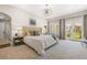 Bright main bedroom with French doors, lots of natural light, and neutral decor at 356 22Nd Ne Ave, St Petersburg, FL 33704