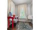 Inviting seating area featuring eclectic furniture, a zebra rug, and bright natural light at 356 22Nd Ne Ave, St Petersburg, FL 33704