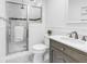 Bathroom with a stand-up shower and stone vanity at 3709 W Santiago St, Tampa, FL 33629