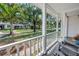 Inviting front porch view showcasing the neighborhood with a cozy seating area and charming curb appeal at 3709 W Santiago St, Tampa, FL 33629