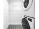 Convenient laundry room featuring modern washer and dryer at 3709 W Santiago St, Tampa, FL 33629