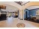 Open-concept view of the foyer, dining room, kitchen, and living room at 3931 Pompano Se Dr, St Petersburg, FL 33705