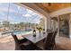 Enjoy outdoor dining near the pool in this screened lanai at 3931 Pompano Se Dr, St Petersburg, FL 33705