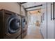 Convenient laundry area with modern washer and dryer near garage entry at 3931 Pompano Se Dr, St Petersburg, FL 33705
