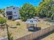 Spacious backyard with gazebo, fenced perimeter, and mature trees, offering a private outdoor retreat at 503 Chestnut St, Oldsmar, FL 34677