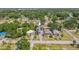 Charming home with solar panels, a spacious driveway, and a well-maintained yard in a serene neighborhood setting at 503 Chestnut St, Oldsmar, FL 34677