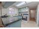 Well-equipped kitchen with granite countertops and plenty of cabinet space at 503 Chestnut St, Oldsmar, FL 34677