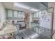Kitchen featuring granite countertops, ample cabinet space, and modern appliances at 503 Chestnut St, Oldsmar, FL 34677