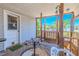 Screened-in porch with wood floors, railings, and ceiling offers beautiful views of the backyard at 503 Chestnut St, Oldsmar, FL 34677