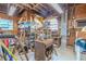 A well-lit workshop with ample storage and a workbench, perfect for hobbies or home improvement projects at 503 Chestnut St, Oldsmar, FL 34677