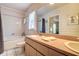 Bright bathroom featuring double sinks, ample counter space, and a tub with shower at 5072 98Th Way, St Petersburg, FL 33708