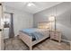 Bedroom featuring tile floors, a large closet, and neutral paint at 5537 Sea Forest Dr # 304, New Port Richey, FL 34652