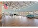 Open-concept space with high ceiling, abundant natural light, and comfortable seating at 5537 Sea Forest Dr # 304, New Port Richey, FL 34652