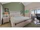 Bright main bedroom featuring a vaulted ceiling, en suite, and neutral color palette at 5537 Sea Forest Dr # 304, New Port Richey, FL 34652