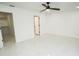 Bright bedroom with walk-in closet and tile flooring at 6509 Dolphin Cove Dr, Apollo Beach, FL 33572