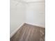 Empty carpeted walk-in closet with wire shelving perfect for storage and organization at 6509 Dolphin Cove Dr, Apollo Beach, FL 33572