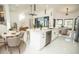 Spacious kitchen boasts a large island, stainless steel appliances, and ample counter space for meal preparation at 6509 Dolphin Cove Dr, Apollo Beach, FL 33572