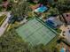 Aerial view of community pool and tennis courts at 678 Greenglen Ln, Palm Harbor, FL 34684