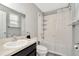 Bright bathroom featuring a shower-tub combination and vanity at 7021 White Treetop Pl, Riverview, FL 33578