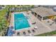 Resort-style pool and sun deck surrounded by lounge chairs and covered seating areas at 7021 White Treetop Pl, Riverview, FL 33578