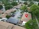 Aerial view showing the property's location, parking, and surrounding neighborhood at 7205 San Luis Ct, Tampa, FL 33634