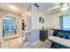 Open-concept dining area with contemporary table and easy access to kitchen and living spaces at 7205 San Luis Ct, Tampa, FL 33634