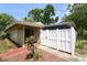 Charming home featuring a welcoming entrance, a privacy fence and neatly manicured landscaping at 7205 San Luis Ct, Tampa, FL 33634