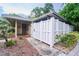 Charming home featuring a welcoming entrance, a privacy fence and neatly manicured landscaping at 7205 San Luis Ct, Tampa, FL 33634