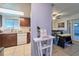 Contemporary kitchen connects to dining area for open living and convenience at 7205 San Luis Ct, Tampa, FL 33634