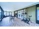 Spacious sunroom featuring tile floors and an exercise area with lots of natural light at 7205 San Luis Ct, Tampa, FL 33634