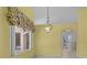 Dining room with view of the entryway and the pool at 731 Waterside Ct, Tarpon Springs, FL 34689
