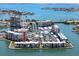 Aerial view showcasing the waterfront condominium complex with its prime waterfront location at 7910 Sun Island S Dr # 203, South Pasadena, FL 33707