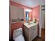 Bathroom with a vanity and ample storage, complemented by a neutral color palette for a relaxing ambiance at 7910 Sun Island S Dr # 203, South Pasadena, FL 33707