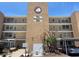 Exterior view of The Yorktown building showcasing its architecture and well-maintained surroundings at 7910 Sun Island S Dr # 203, South Pasadena, FL 33707