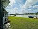 Lush backyard with waterfront view and private dock at 808 53Rd E Ave # 142K, Bradenton, FL 34203